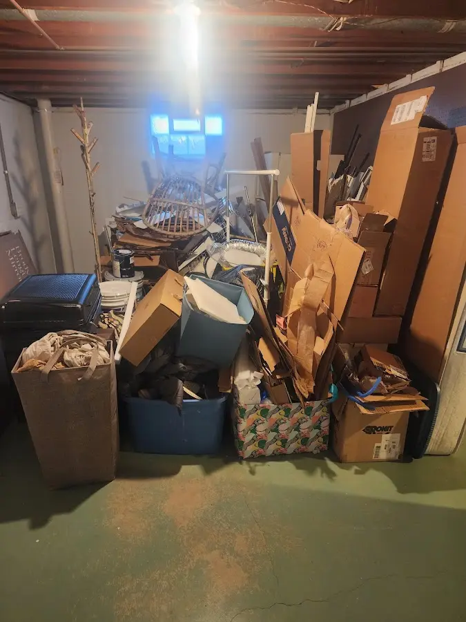 Roll-off dumpster container at job site for Concrete Dumpster Rental in Fort Madison